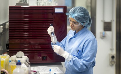 A vaccine researcher works in a labortory